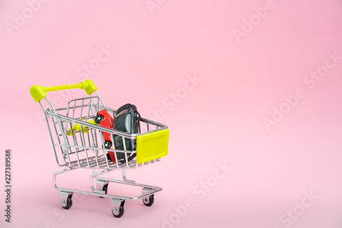 Collection of shopping cart full of shopping time.Top view or flat lay composition cart on color background.online shopping concept.