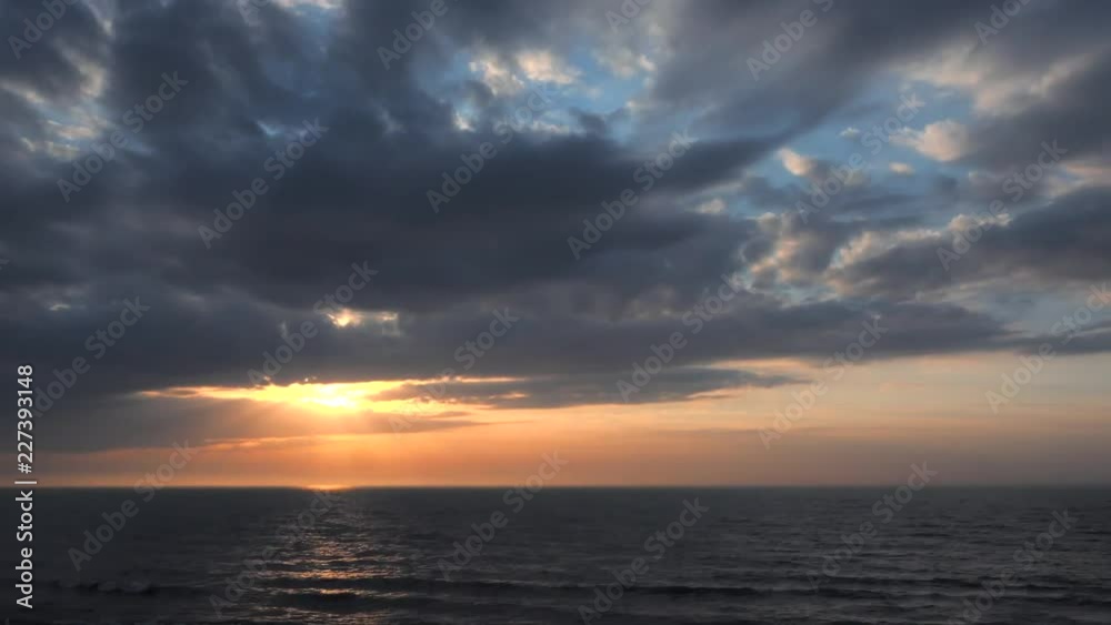 Incredibly beautiful time lapse clouds racing past in stunning sky, showing weather and the fast passage of time. Incredibly beautiful time lapse clouds racing past in stunning sky, showing weather and the fast passage of time.