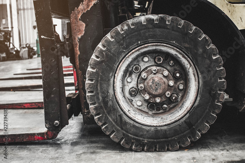 The front wheels of the forklift. © dekliyngkaea