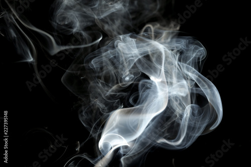 Smoke or steam on a black background, Abstract