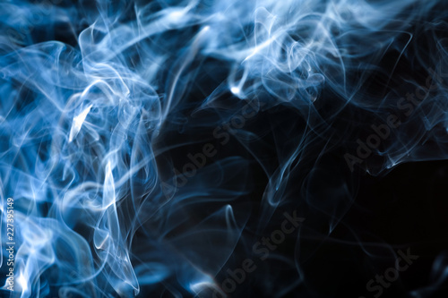 Smoke or steam on a black background, Abstract