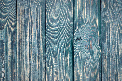 Background from wooden vintage texture boards with remnants of old paint. Vertical.