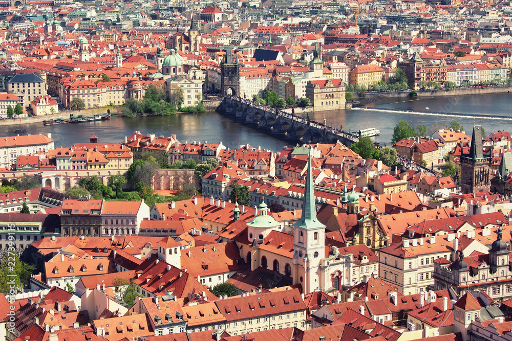 Aerial view to Prague historic center with Charles Bridge in the middle