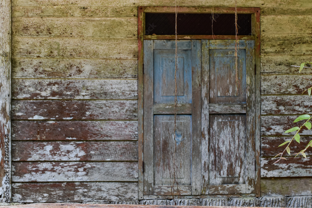 Windows of old and wooden plank wall. Windows of old and wooden plank wall.