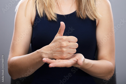 Woman Using Sign Language