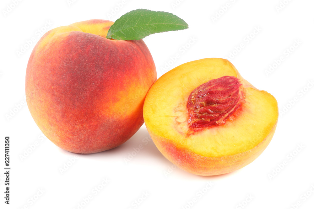 peach fruit with green leaf and slices isolated on white background peach fruit with green leaf and slices isolated on white background