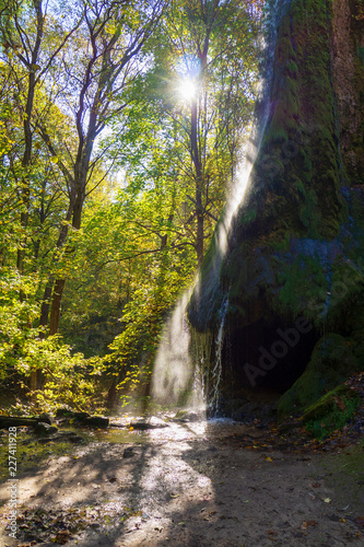 Beautiful waterfall in the park. © Oleksandr Masnyi