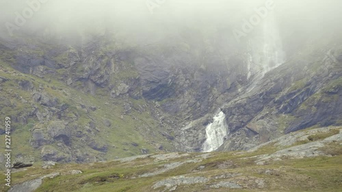 Clips from a day with fast moving clouds and a mystic late summer light, filmed in a valley in Riksgr√§nsen in swedish lapland. Clips containing a running standard poodle, an amazing waterfall and more photo