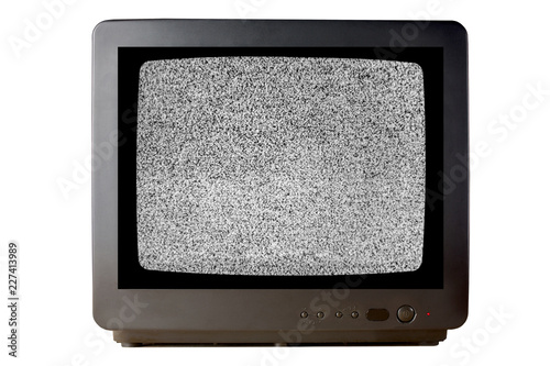 Old vintage TV set televisor isolated on white background with no signal television grainy noise effect on the screen. photo