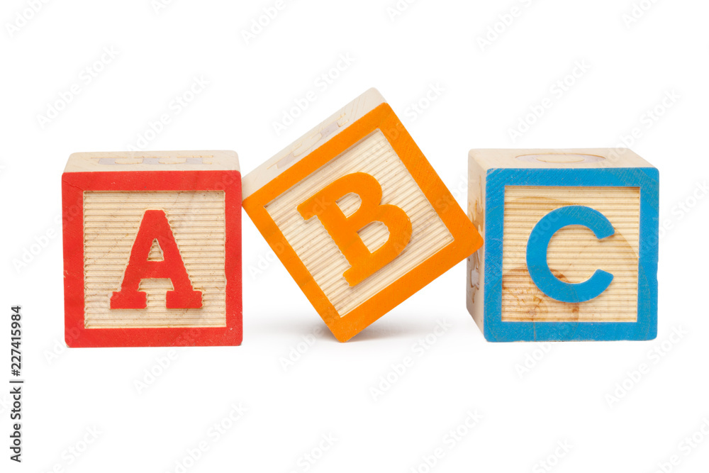 Wooden alphabet blocks isolated on white background Wooden alphabet blocks isolated on white background
