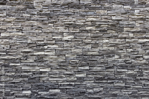 Valokuvatapetti Texture of artificial gray stone wall