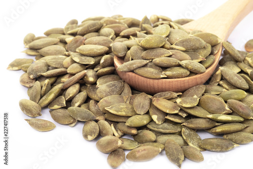 Pumpkin seeds on a white background