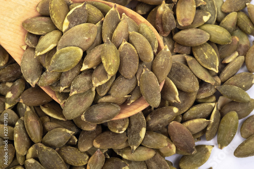 Pumpkin seeds on a white background