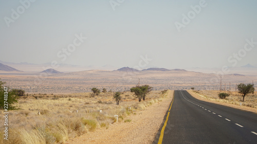 Driving through the Namid Desert near Lüderitz, Namibia. photo