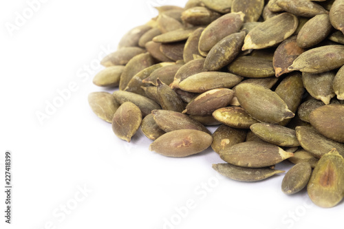 Pumpkin seeds on a white background