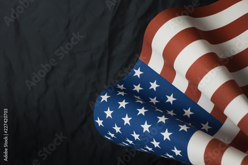 Fototapeta Naklejka Na Ścianę i Meble -  The Veterans Day  concept united states of America flag on black background..
