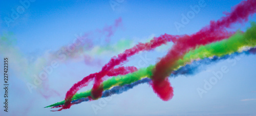 aerobatic performance with a rainbow smoke