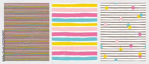 Set of 3 Hand Drawn Irregular Striped Vector Patterns. Horizontal Colorful Stripes on a White and Brown Background. Abstract Infantile Style Design. White, Pink, Blue and Yellow Lines and Dots.  photo