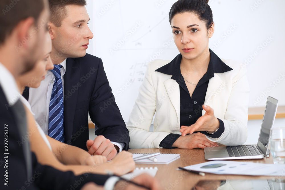 Business people at meeting in office background. Successful negotiation of business team or lawyers Business people at meeting in office background. Successful negotiation of business team or lawyers