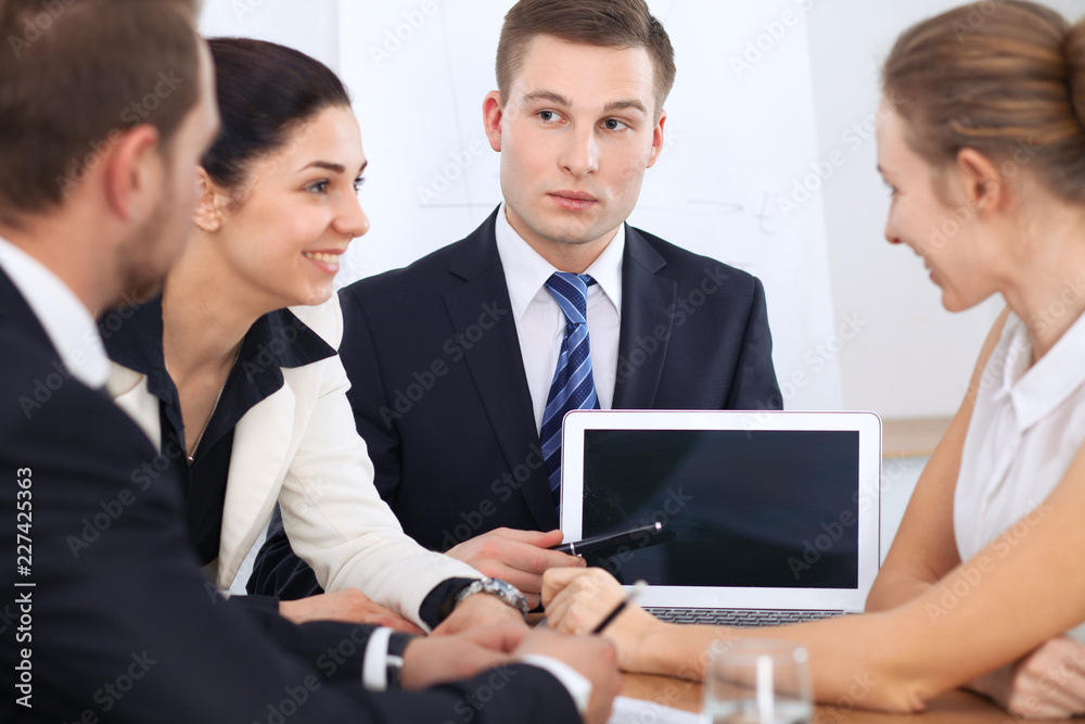 Business people at meeting in office background. Successful negotiation of business team or lawyers Business people at meeting in office background. Successful negotiation of business team or lawyers