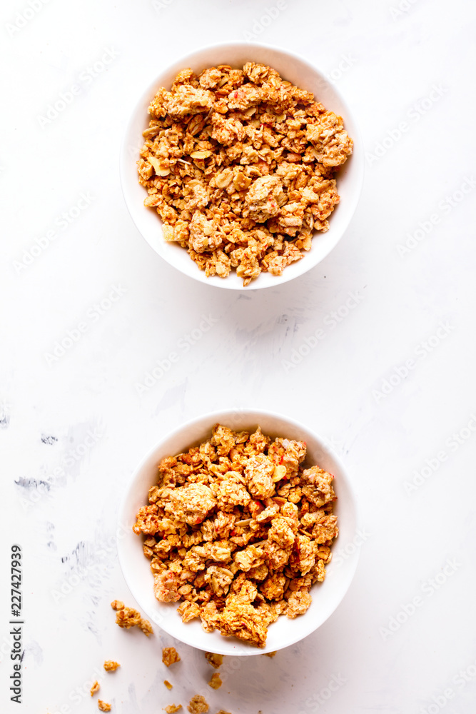 Granola Cereal bar on light Background . Muesli Breakfast. Healthy Food sweet dessert snack. Diet Nutrition Concept. Vegetarian food. Flat Lay. Copy space Granola Cereal bar on light Background . Muesli Breakfast. Healthy Food sweet dessert snack. Diet Nutrition Concept. Vegetarian food. Flat Lay. Copy space
