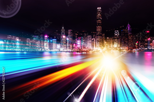 Abstract Light trails background with Hong Kong City scraper. double exposure © joeycheung