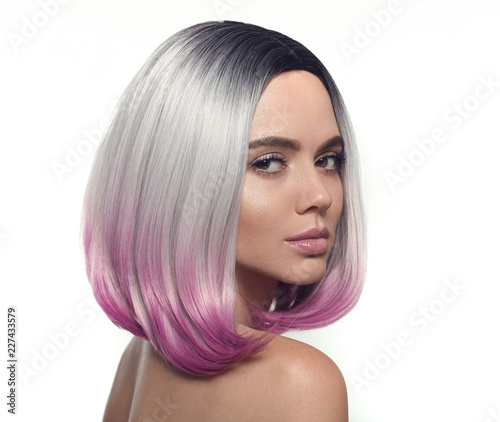 Ombre bob short hairstyle. Beautiful hair coloring woman. Trendy haircuts. Blond model with short shiny hairstyle. Concept Coloring Hair. Beauty Salon.