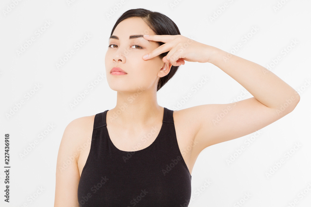 Beautiful asian woman isolated on white background. Anti aging and wrinkles concept. Skin care and female face. Copy space Beautiful asian woman isolated on white background. Anti aging and wrinkles concept. Skin care and female face. Copy space