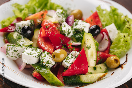 Greek salad on a white plate