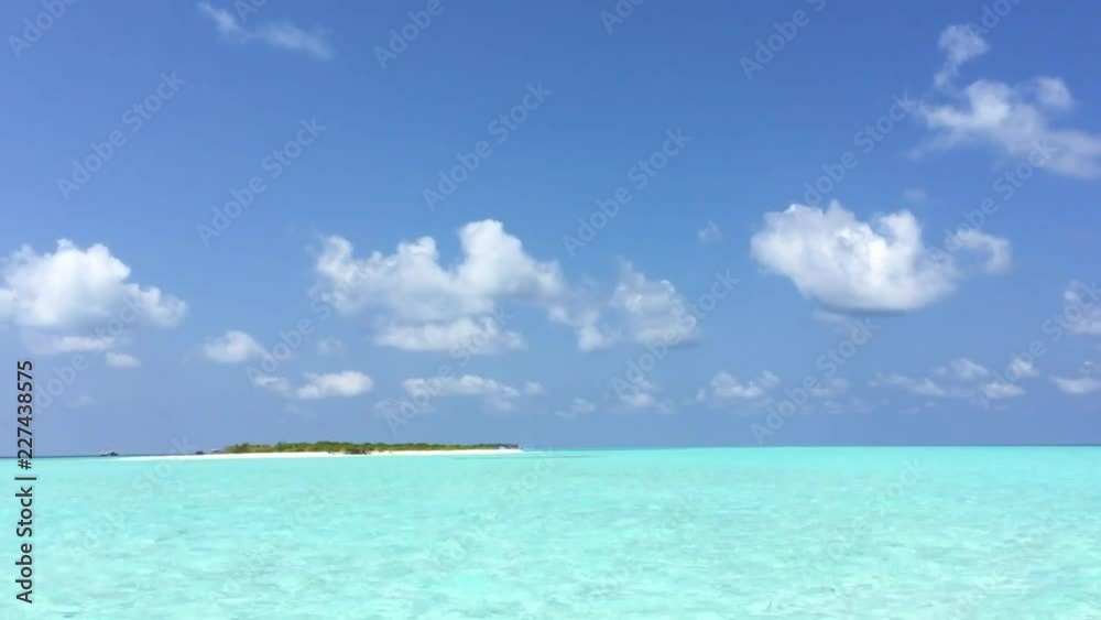 Maldives island time lapse of clouds over the sea Maldives island time lapse of clouds over the sea