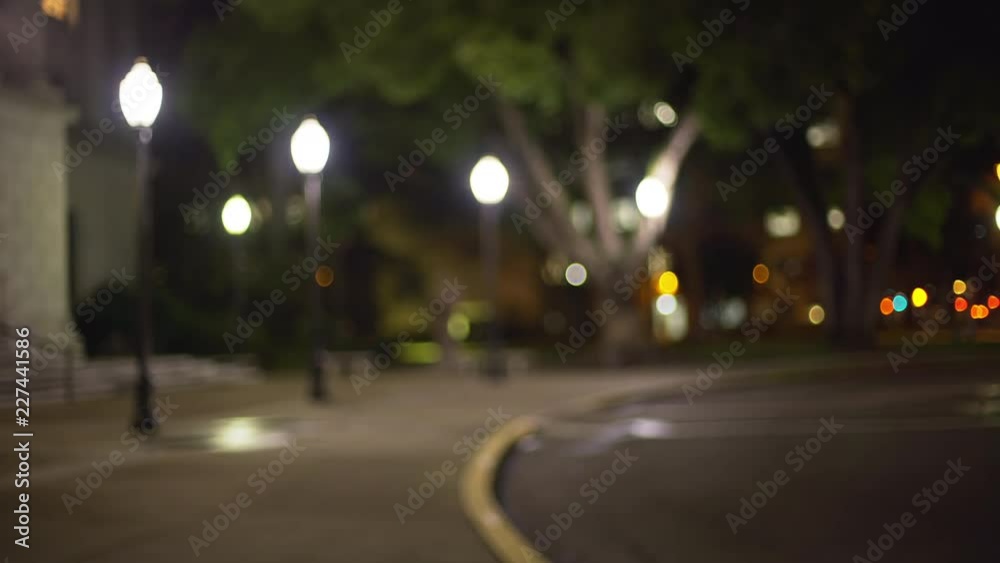 Out of focus background plate of curved roadway in urban park Out of focus background plate of curved roadway in urban park