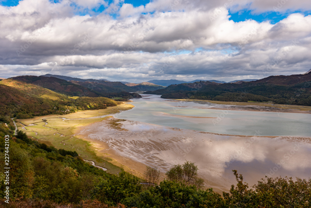 Mawddach river estuary at low tide with views to Snowdonia at low tide, near Barmouth, Wales