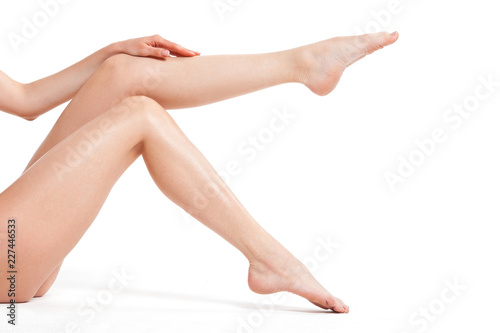Beautiful smooth legs of young woman close-up