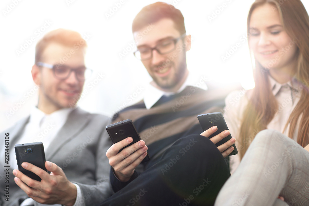 closeup. employees talking in the workplace closeup. employees talking in the workplace