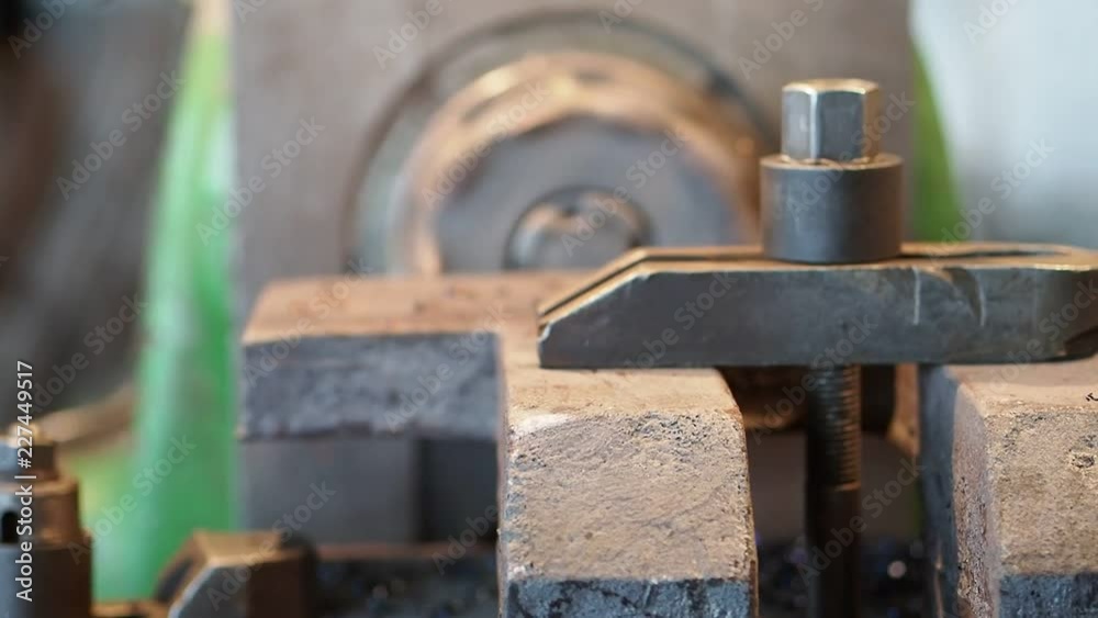 Process of production of a detail. Working process of production at machine-building enterprise. The foreground is accurate, and back it is indistinct. Process of production of a detail. Working process of production at machine-building enterprise. The foreground is accurate, and back it is indistinct.