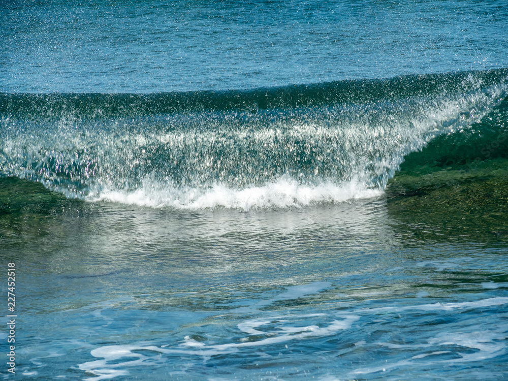 Naklejka premium Small sea waves, Crete island, Greece