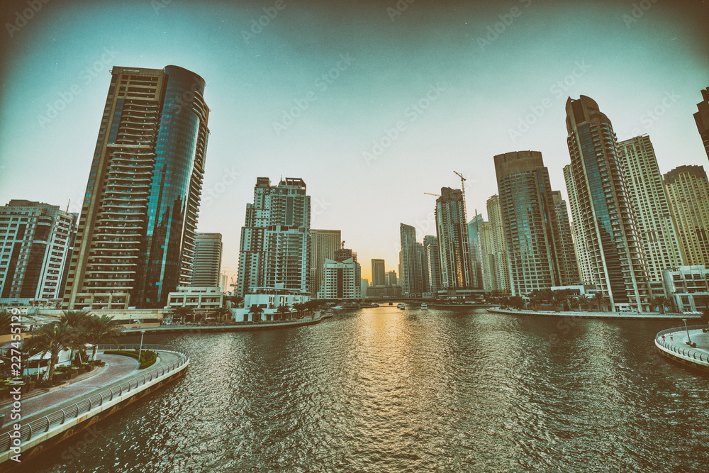 Fototapeta premium Beautiful sunset skyline of Dubai Marina, United Arab Emirates