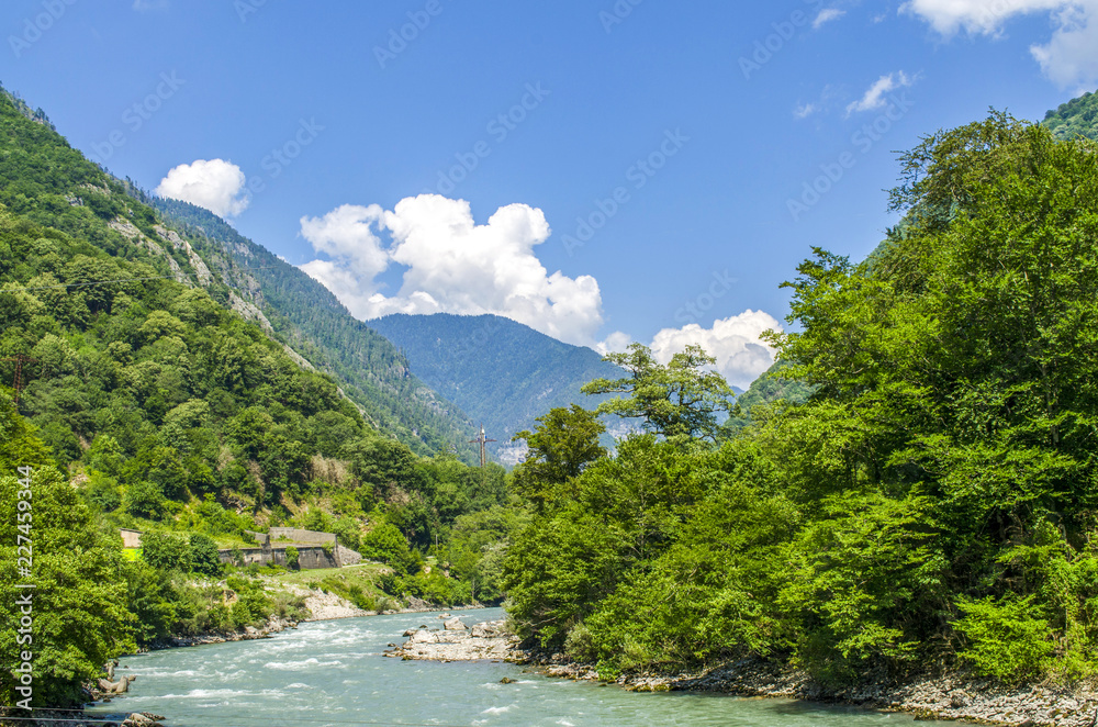 Turquoise river in the Caucasus mountains