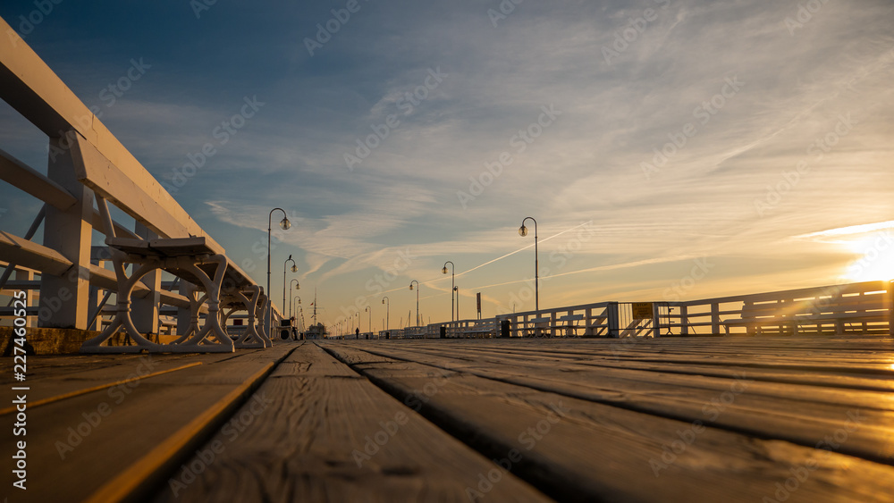 The Sopot Pier in the city of Sopot. The pier is the longest wooden pier in Europe. Beautiful sunrise.