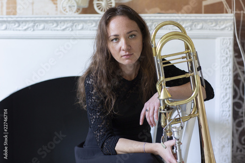 Konstfotografi Portrait of a young woman trombonist