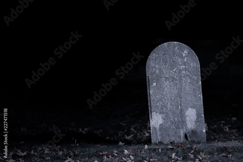 Graveyard Tombstone in Darkness photo