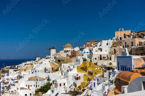 Santorini, Greece. Picturesque view of traditional cycladic Santorini houses on cliff © Stefanos Kyriazis