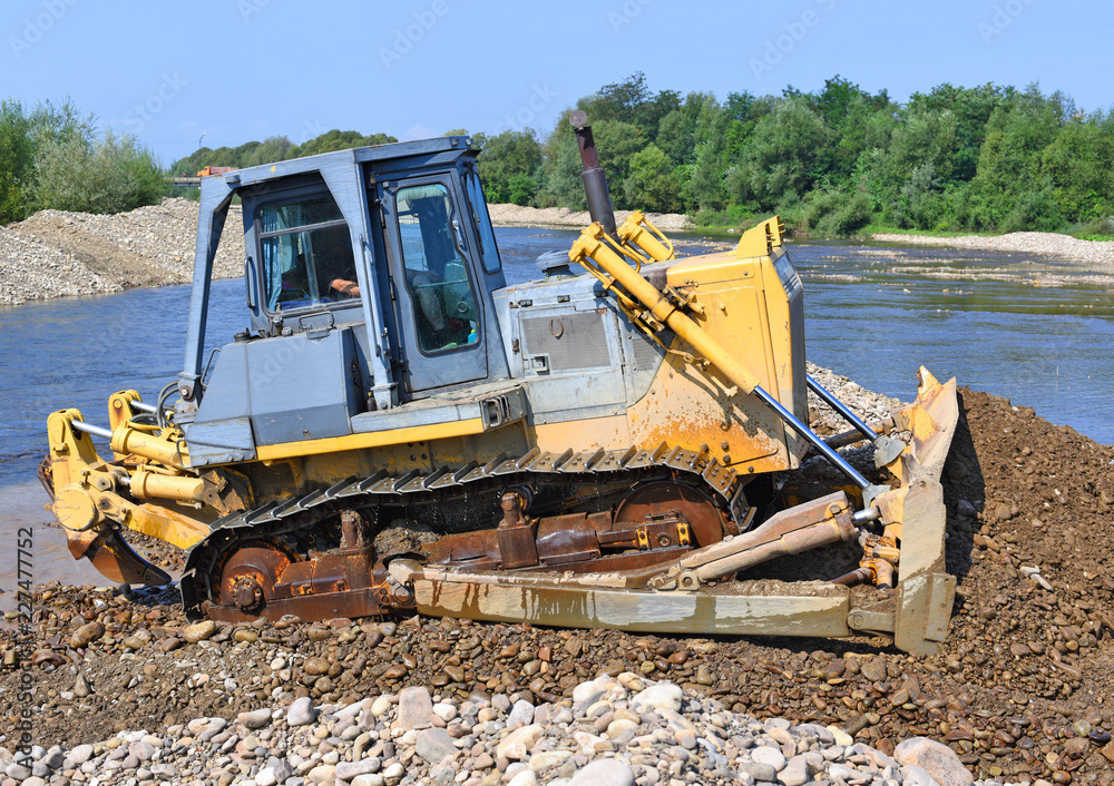 The bulldozer on a building site The bulldozer on a building site
