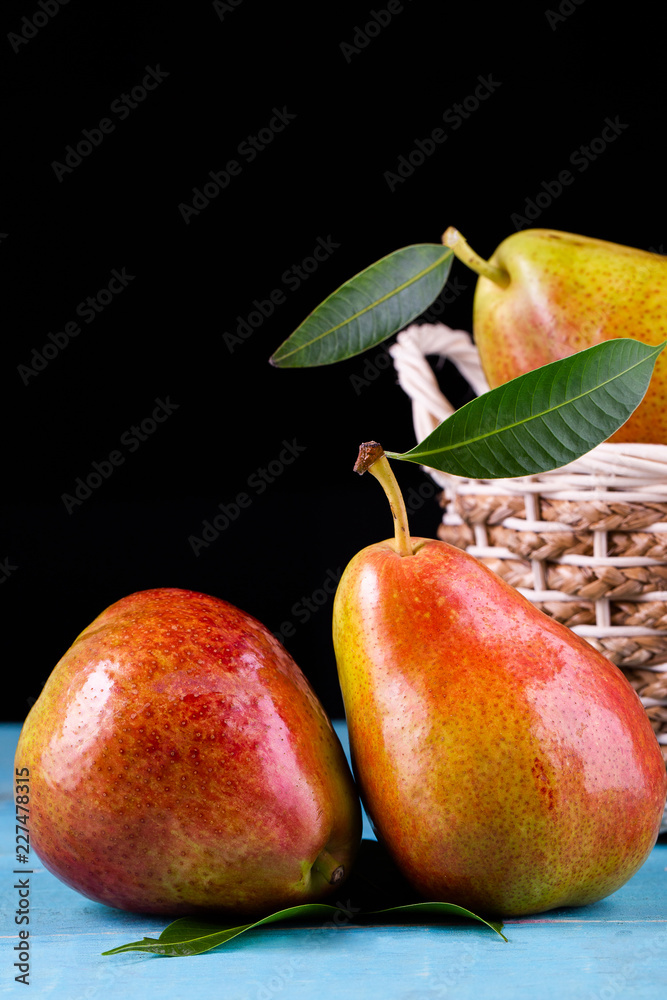 Fresh ripe organic pears on rustic wooden table Fresh ripe organic pears on rustic wooden table