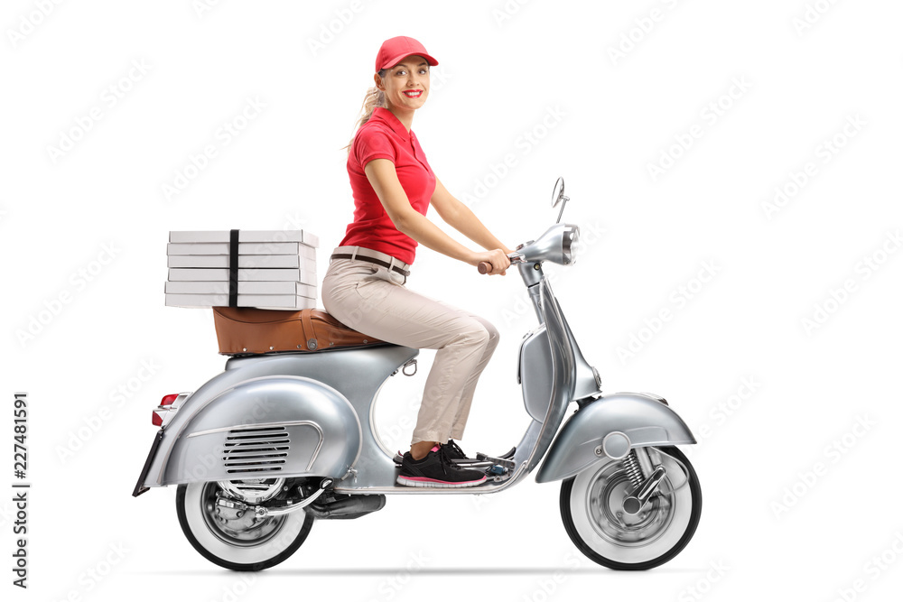 Smiling pizza delivery woman on a scooter with pizza boxes Smiling pizza delivery woman on a scooter with pizza boxes