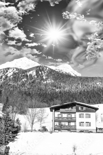 Mountain cabin with berautiful sky photo