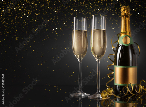 Champagne bottle and flutes for Christmas celebration