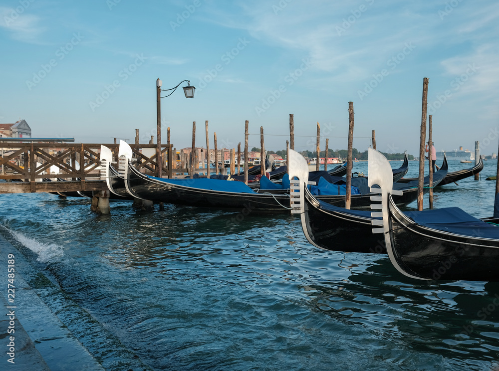 Venice, Italy, September 16, 2018 - Gondolas on the dock near Piazza San Marco