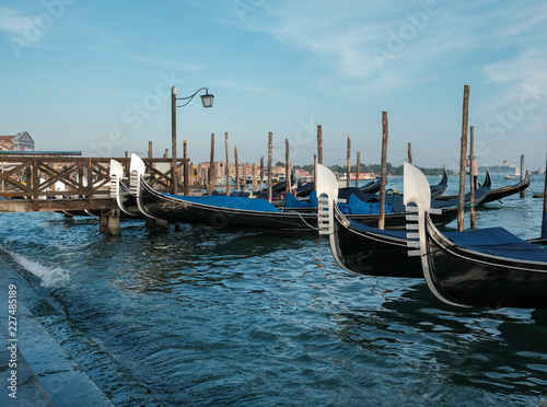 Venice, Italy, September 16, 2018 - Gondolas on the dock near Piazza San Marco