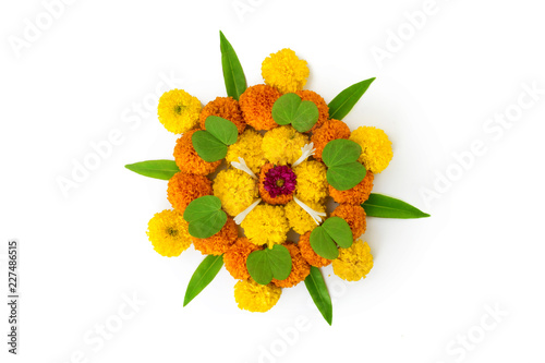 Dashera Festival apta leaf with marigold flower rangoli photo